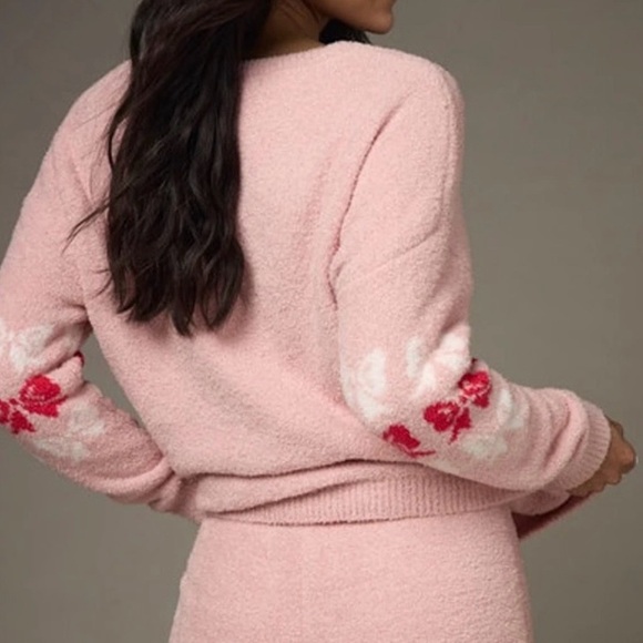 Francesca's Collections Blush V-Neck Sweater with Red and White Bow Pattern - Picture 2 of 9